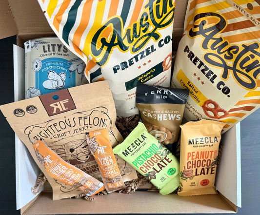 Gift box with pretzels, potato chips, craft jerky, nut bars, and roasted cashews