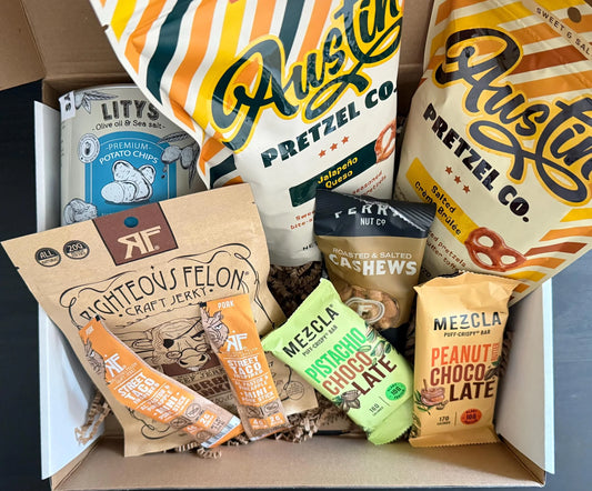 Gift box with pretzels, potato chips, cashews, jerky, and chocolate snack bars