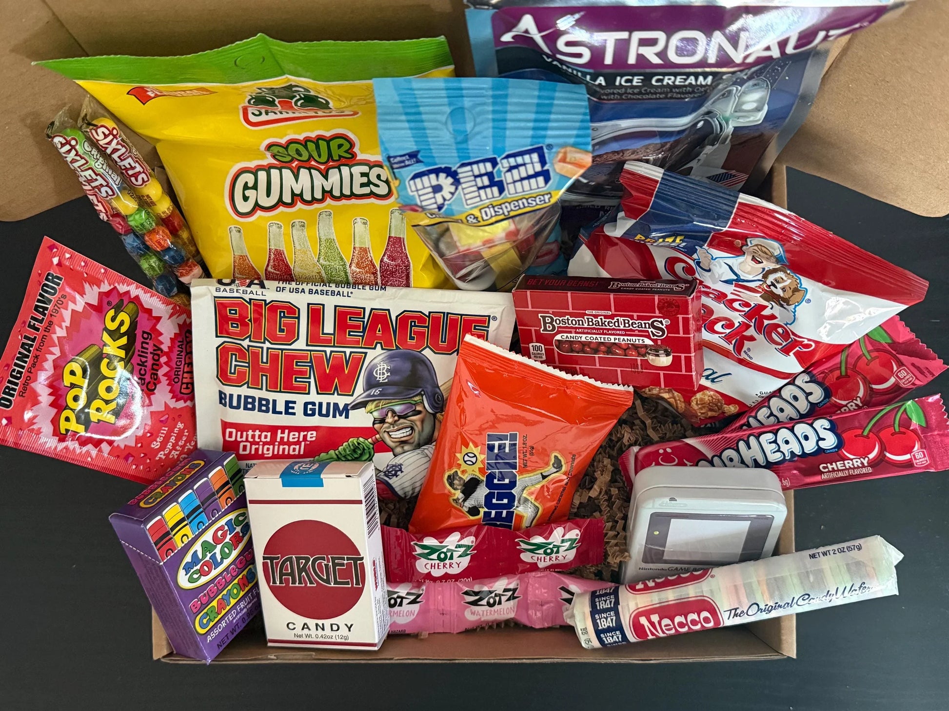 Assorted nostalgic candy gift box with gummies, bubble gum, wafers, and novelty sweets