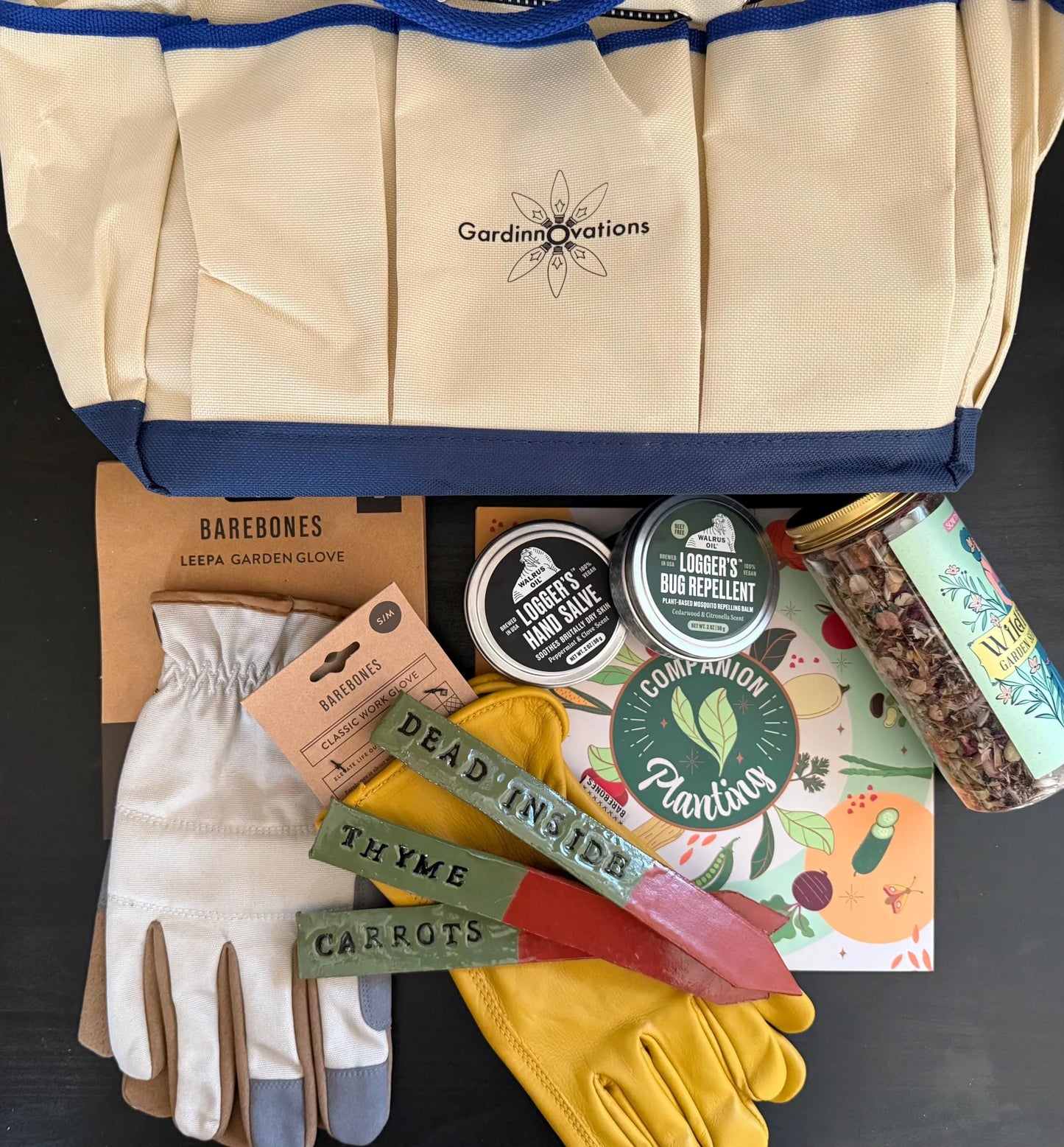Garden gift set with gloves, plant markers, hand salve, bug repellent, and seed tube