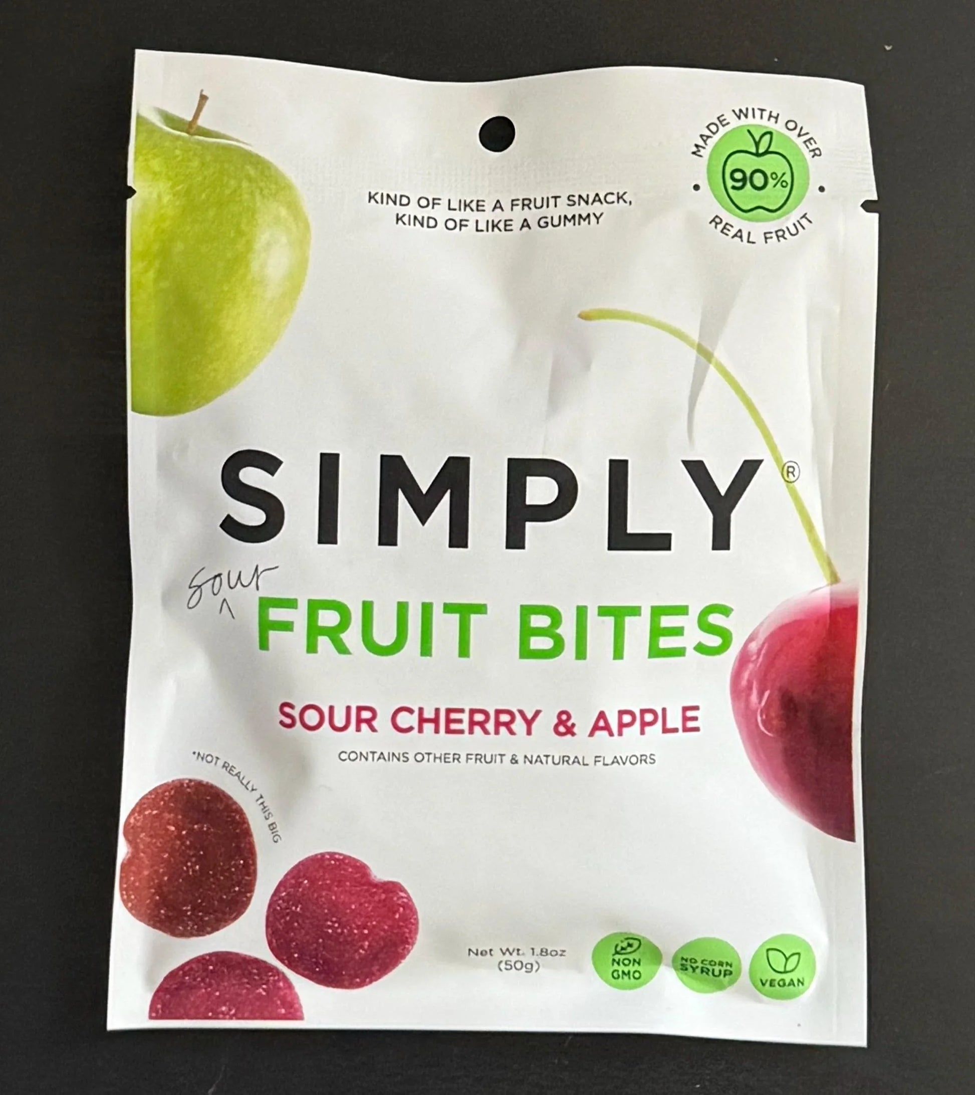 Simply Fruit Bites sour cherry and apple snack bag with images of green apple and cherry.